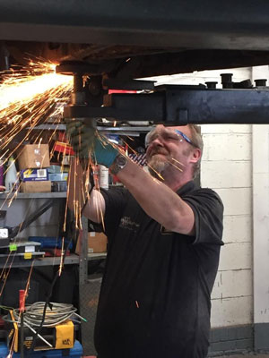 Gary-Wood-Working-on-the-Team-TerraClean-vehicle